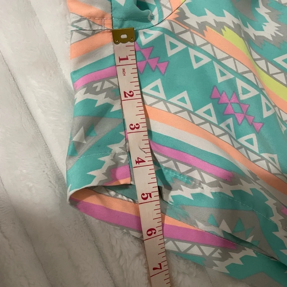 chubbies Turquoise Aztec Swim Trunks with Pink and Yellow Accents
